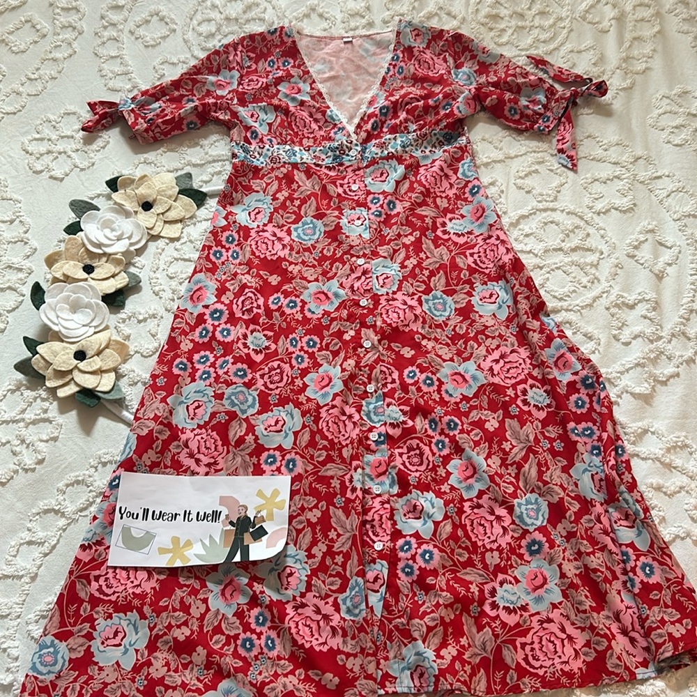 Red floral A-line dress with contrasting fabric at the empire waist. Size S